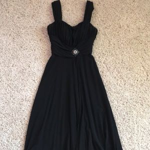 Black formal dress with gem pin